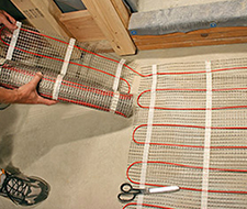 Be sure the cable spacing is correct and then run the next row with the floor heating mat.